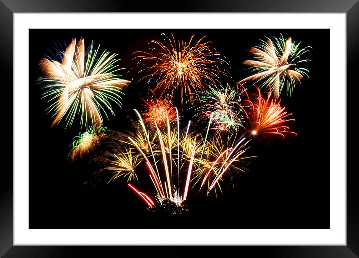Many firework explosions in the sky Framed Mounted Print by Simon Bratt LRPS