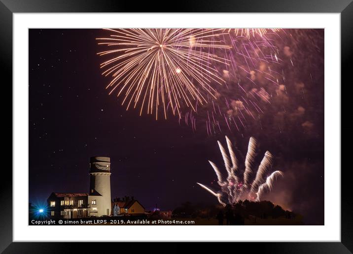 Bonfire night foreworks over lighthouse in Norfolk Framed Mounted Print by Simon Bratt LRPS