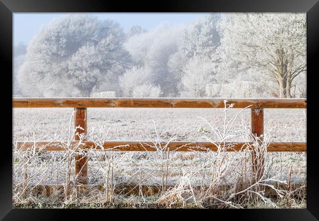 Rural winter snow scene and fence Framed Print by Simon Bratt LRPS