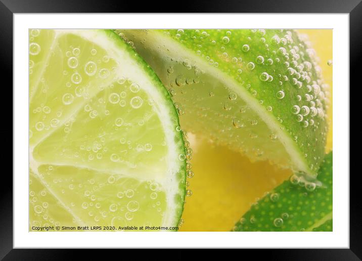 Lemon and lime slices in water Framed Mounted Print by Simon Bratt LRPS