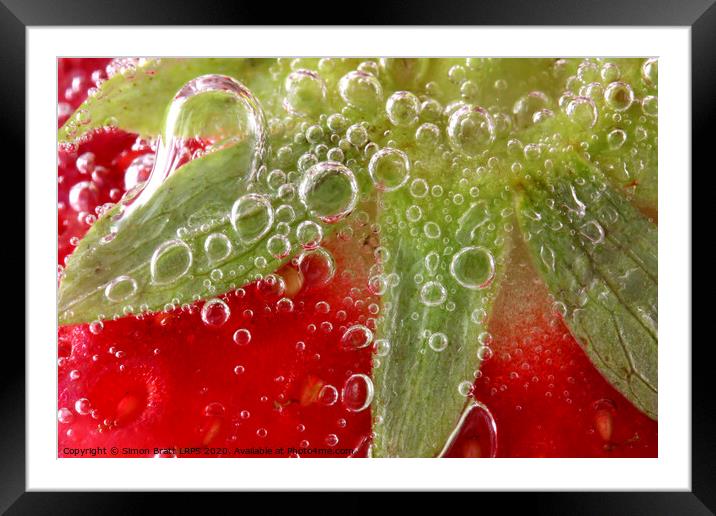Strawberries in water close up Framed Mounted Print by Simon Bratt LRPS