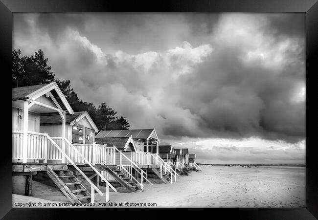 Wells next The Sea Beach huts in black and white on sandy coast Framed Print by Simon Bratt LRPS