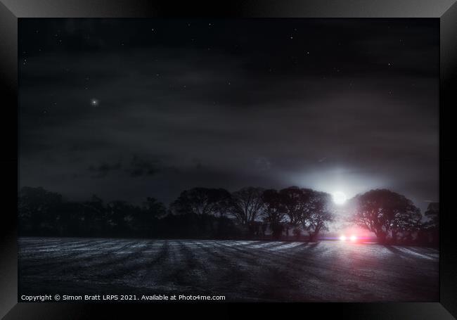 Lone driver in a dark field Framed Print by Simon Bratt LRPS