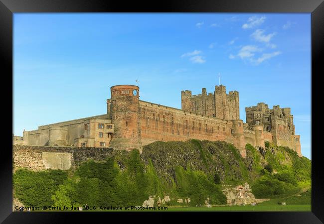 Bamburgh Castle on a August day. Framed Print by Ernie Jordan