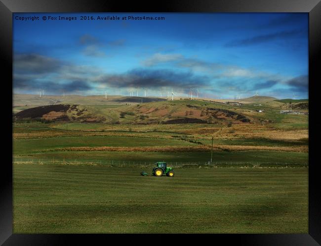 Tractor in the countryside Framed Print by Derrick Fox Lomax