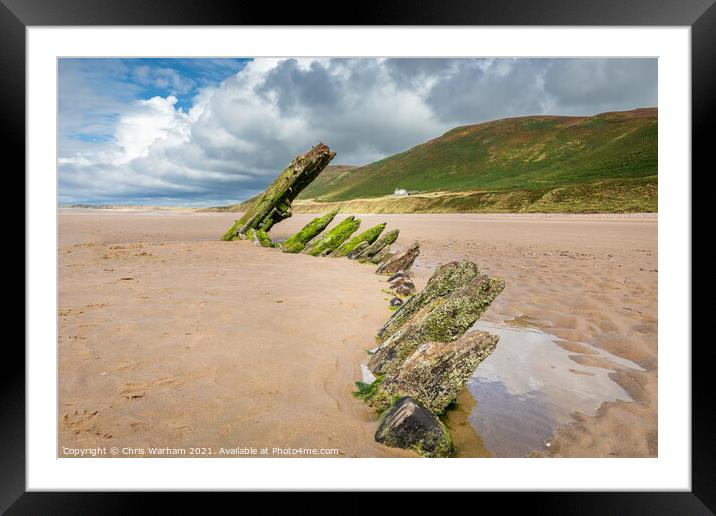 Old shipwreck on Rhosilli beach on the Gower Framed Mounted Print by Chris Warham