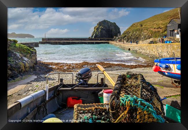 Mullion Cove and harbour after a storm Framed Print by Chris Warham