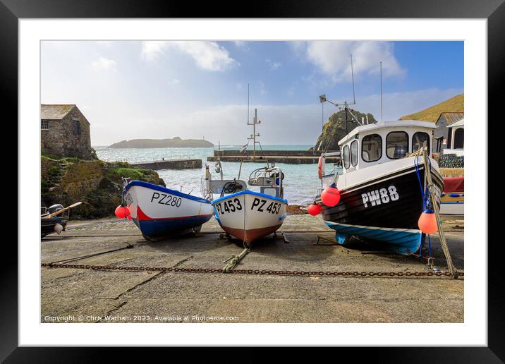 Fishing Boats in Mullion Cove pulled onto the slipway to avoid a storm . Framed Mounted Print by Chris Warham