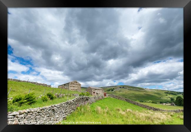 Swaledale Barns and cloudscape Framed Print by Chris Warham