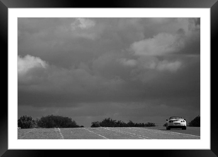 Nissan GT-R eating up the straights Framed Mounted Print by Steven Hurrell