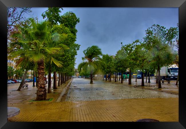 Lonely promenade on a rainy day in Carmona - Seville - Framed Print by Jose Manuel Espigares Garc