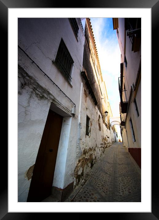 Narrow and lonely street with arch Framed Mounted Print by Jose Manuel Espigares Garc
