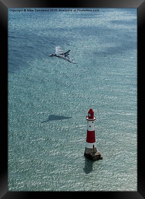  Avro Vulcan low pass over Eastbourne lighthouse Framed Print by Mike Sannwald