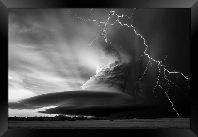 The Dark Side of the Storm.  Framed Print by John Finney