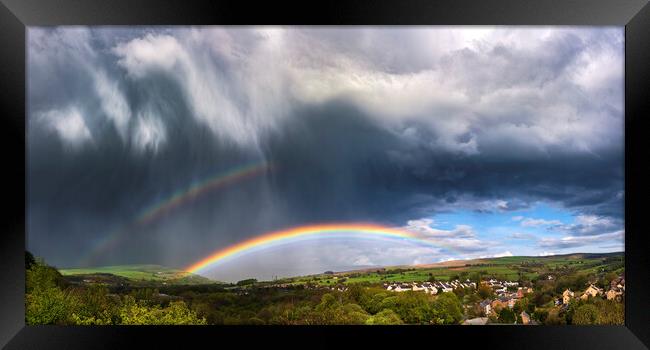 Dramatic skies over Derbyshire with double rainbow Framed Print by John Finney