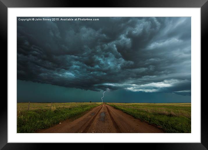  Lightning, End of the road. Tornado alley, USA.  Framed Mounted Print by John Finney
