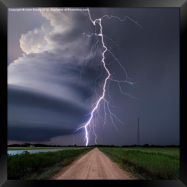 Huge lightning strike over Nebraska, USA.  Framed Print by John Finney