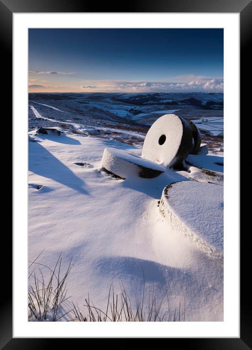 Millstones in the Snow, Derbyshire.  Framed Mounted Print by John Finney