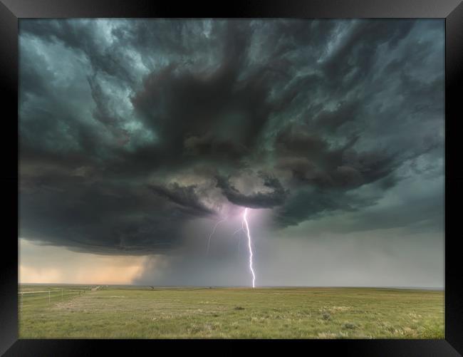 ThunderBolt over Colorado Framed Print by John Finney