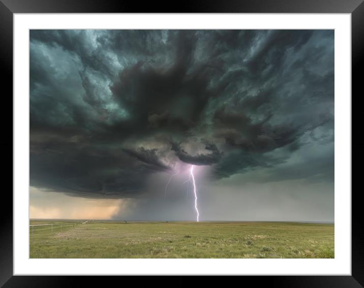 ThunderBolt over Colorado Framed Mounted Print by John Finney