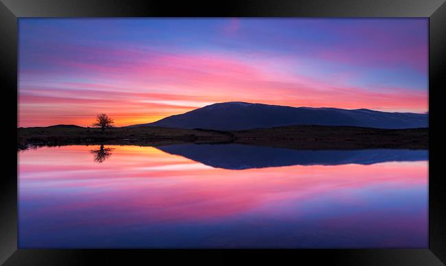 Tewet Tarn sunrise. Lake District Framed Print by John Finney