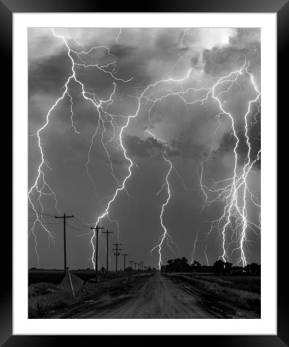 Lightning storm over Nebraska. black and white Framed Mounted Print by John Finney