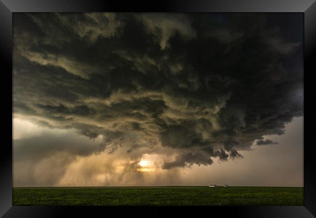 Thunderstorm over Montana Framed Print by John Finney
