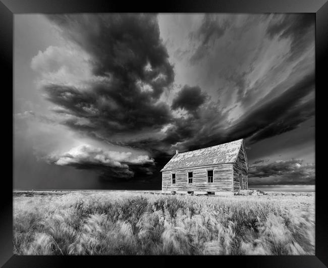 Abandoned Schoolhouse with a Storm, Colorado  Framed Print by John Finney