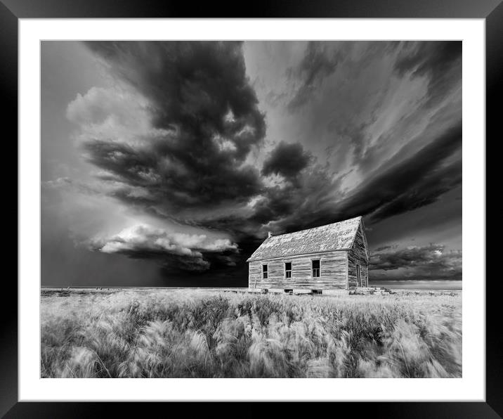 Abandoned Schoolhouse with a Storm, Colorado  Framed Mounted Print by John Finney
