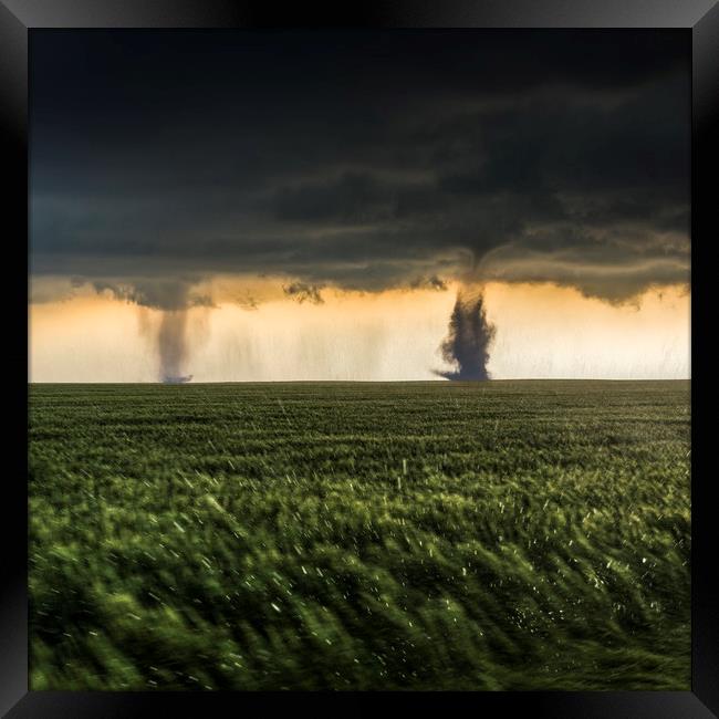 Sister Tornadoes in a Ferocious Storm Framed Print by John Finney