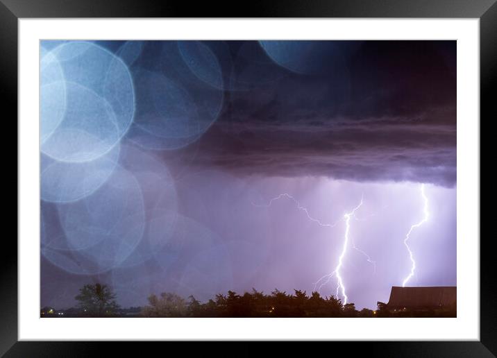 Bokeh Lightning. Texas. Framed Mounted Print by John Finney
