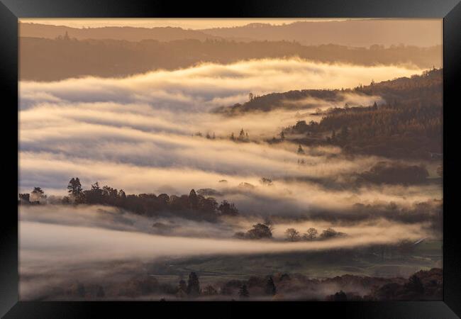 Lake Windermere flowing fog Framed Print by John Finney