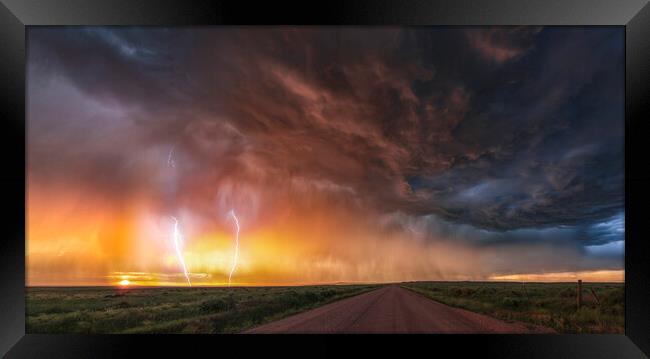Double Lightning Bolts at sunset, Colorado Framed Print by John Finney