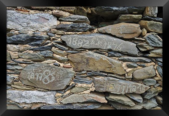 Old schist wall with several dates from the 19th c Framed Print by Angelo DeVal