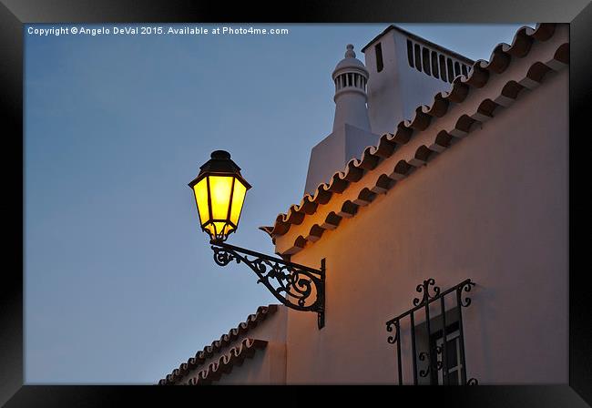 Warm Glow of Algarve Street Lamp Framed Print by Angelo DeVal