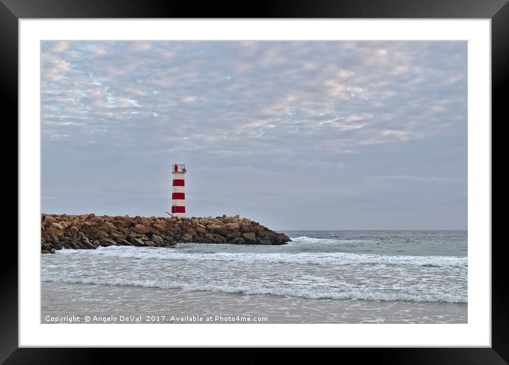 Light tower and rocks in Ilha Deserta, Algarve Framed Mounted Print by Angelo DeVal