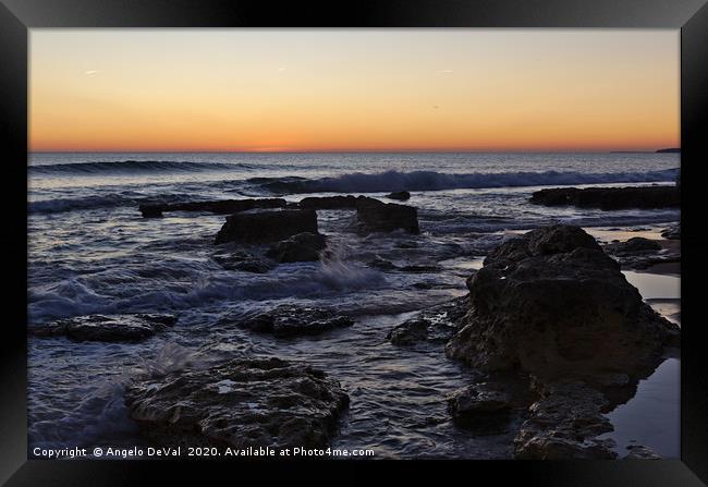 Twilight waves and rocks in Albufeira Framed Print by Angelo DeVal