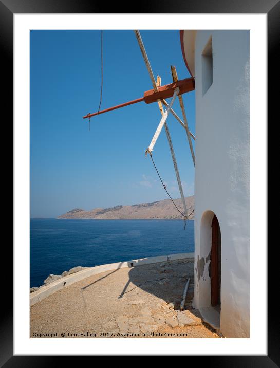 Tilted Windmill Framed Mounted Print by John Ealing