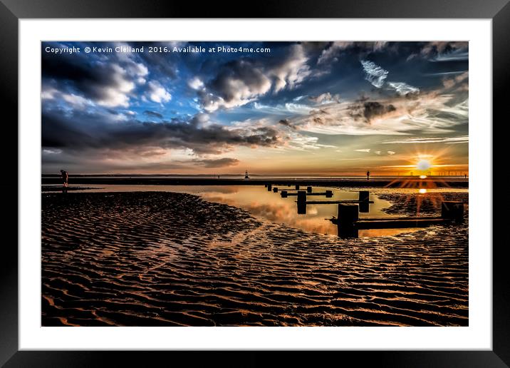 Sun setting at Crosby Beach Framed Mounted Print by Kevin Clelland