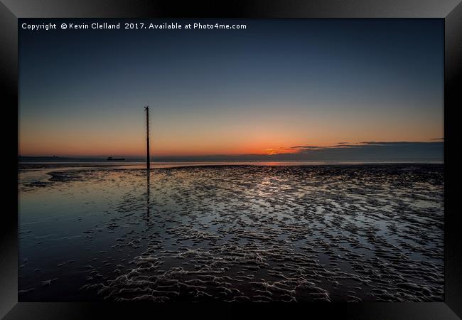 Crosby Beach as the sun sets Framed Print by Kevin Clelland