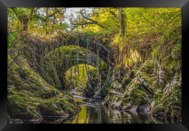 Penmachno Roman Bridge  Framed Print by Chris Evans