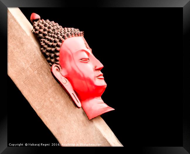 A head shot of hand made buddha on a wood in Kathm Framed Print by Nabaraj Regmi