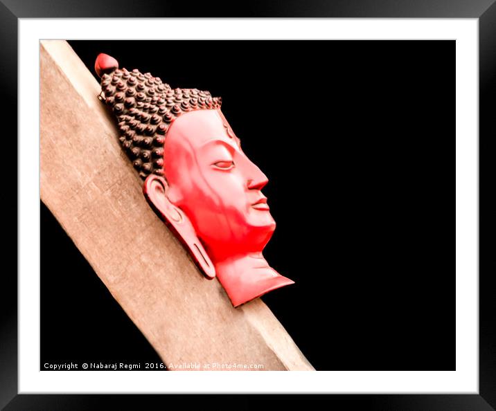 A head shot of hand made buddha on a wood in Kathm Framed Mounted Print by Nabaraj Regmi