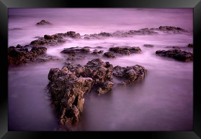 Rocks in the Sea Framed Print by Ray Pritchard