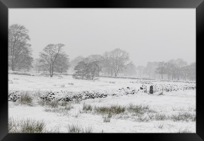 Snow covers the landscape  Framed Print by chris smith
