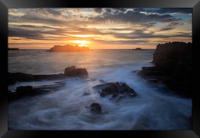 Sunset at Cobo Bay  Framed Print by chris smith