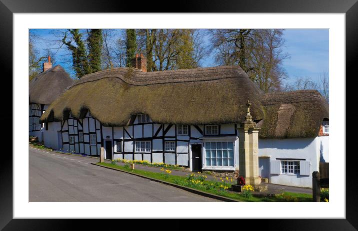 Thatched Cottage and War Memorial Wherwell,Hampshire ,England. Framed Mounted Print by Philip Enticknap
