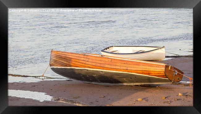Boat on the water Framed Print by Sebastien Coell