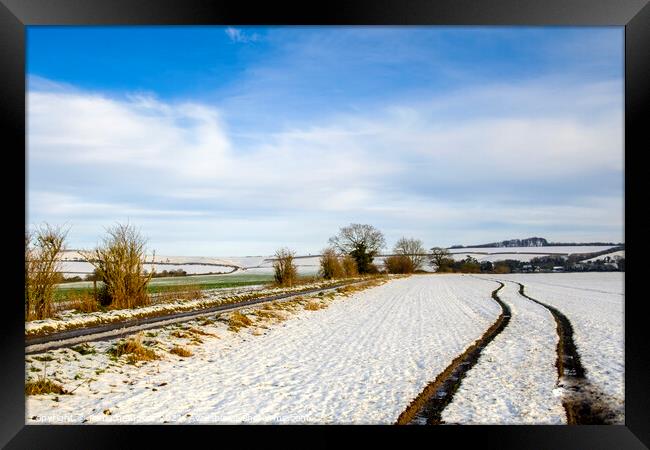 Winter Scenes in Wiltshire a snow covered field at Framed Print by Paul Chambers
