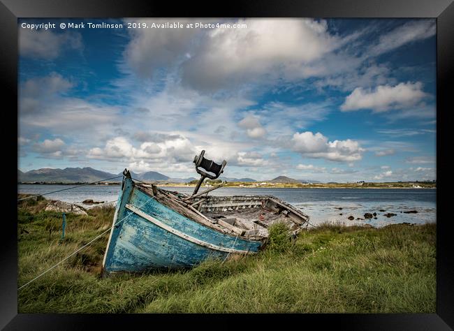Weathered Boat on the Irish Coast Framed Print by Mark Tomlinson